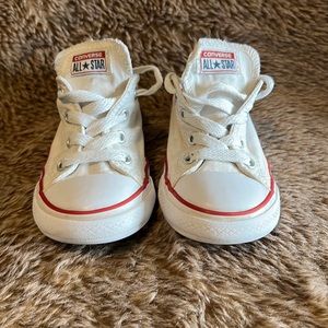 White low top converse.